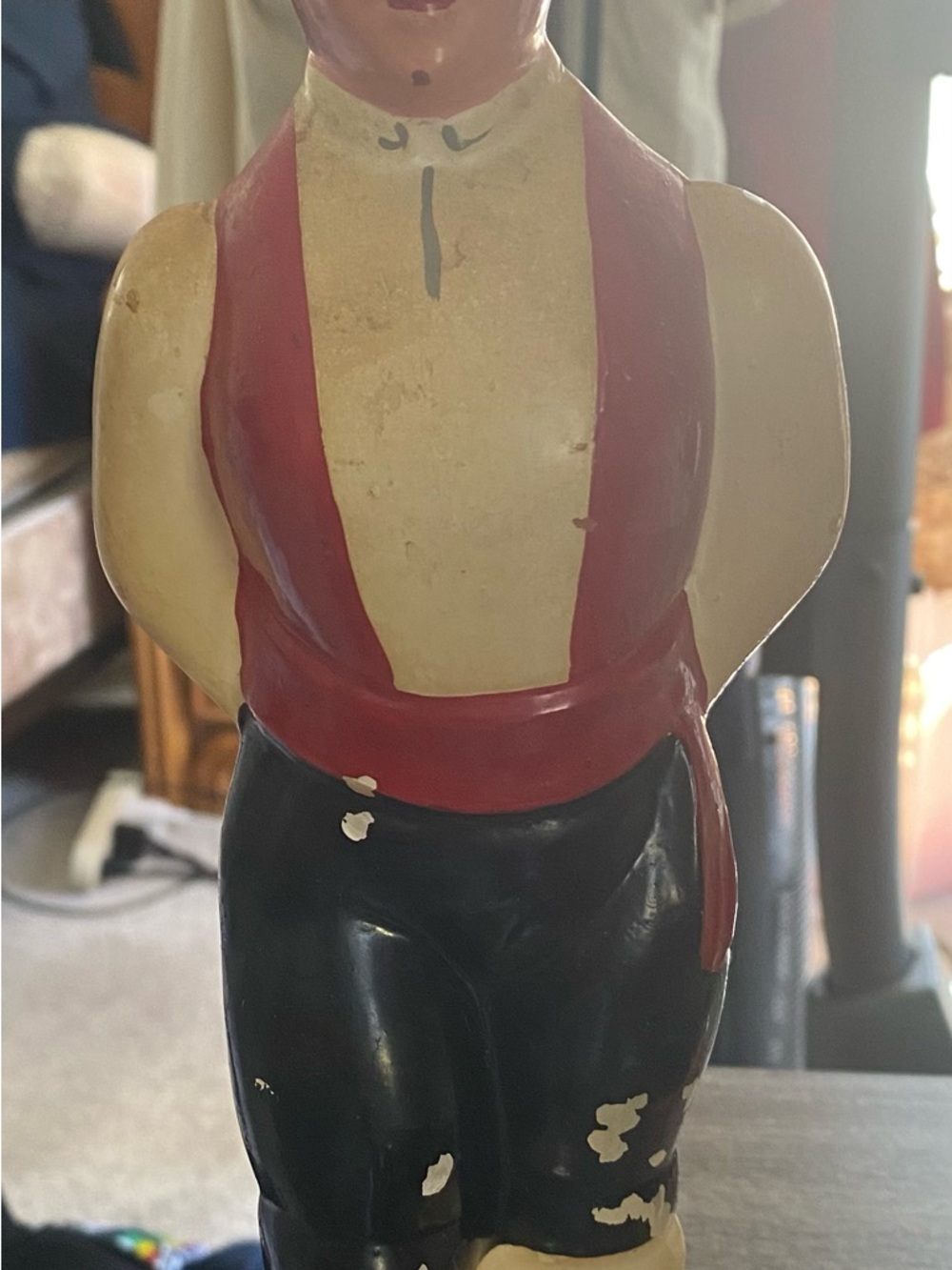 Vintage Painted Ceramic Figurine with Red Vest and Black Pants
